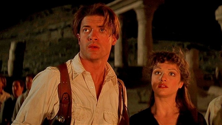 Rick and Evelyn look up in amazement in The Mummy (1999)