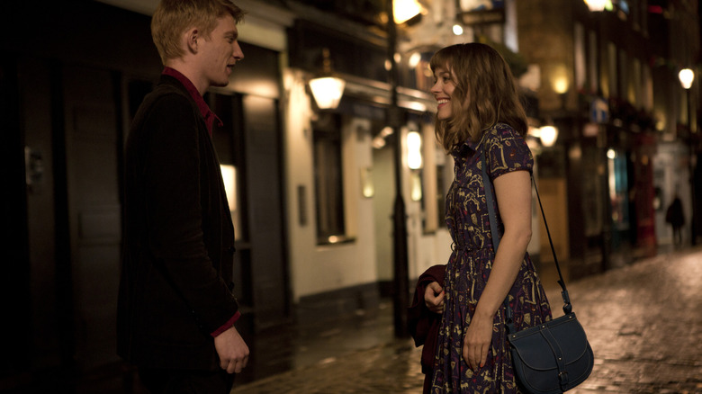 Tim and Mary talking on a London street in About Time