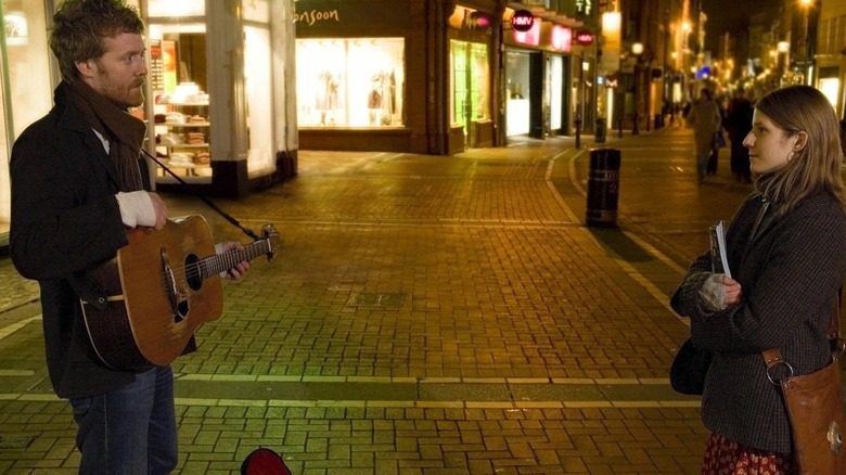 Guy and Girl meeting in the street