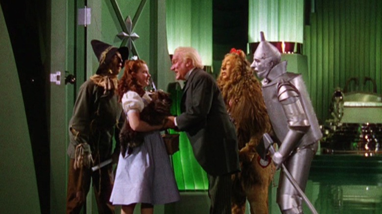 Dorothy and friends talking with The Wizard