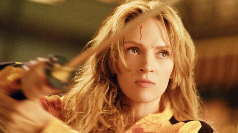 The Bride wields a sword in "Kill Bill: Vol. 1" (2003)