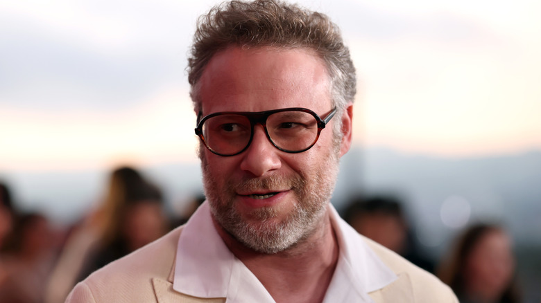 Seth Rogen smiling and wearing glasses