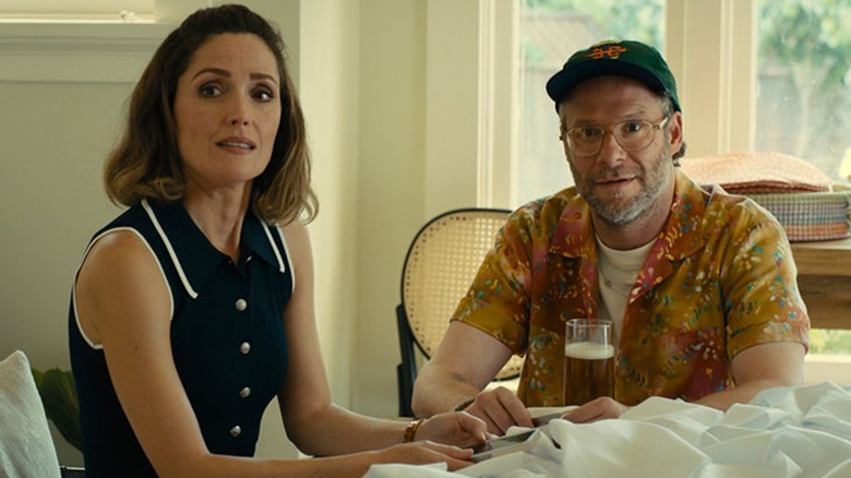 Sylvia and Will sitting at a table in "Platonic" (2023)