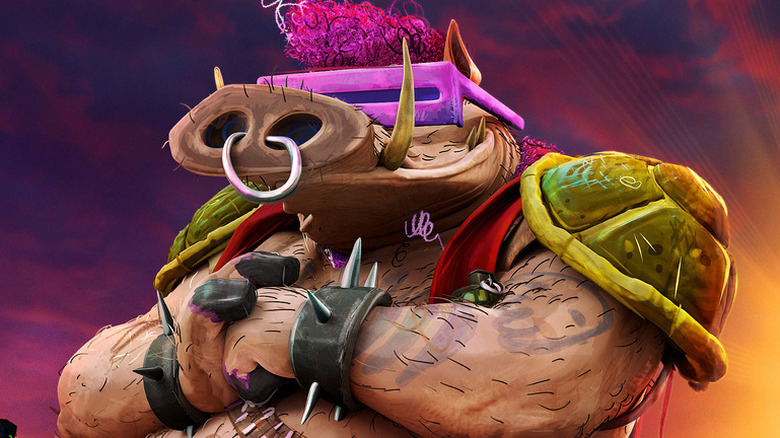 Bebop punching his hand in "Teenage Mutant Ninja Turtles: Mutant Mayhem" (2023)