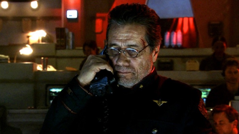 Adama talks into the command phone in "Battlestar Galactica" (2003-2009)