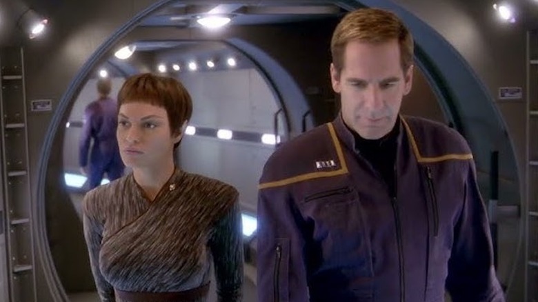 Archer and T'Pol walk down a corridor in "Enterprise" (2001-2005)