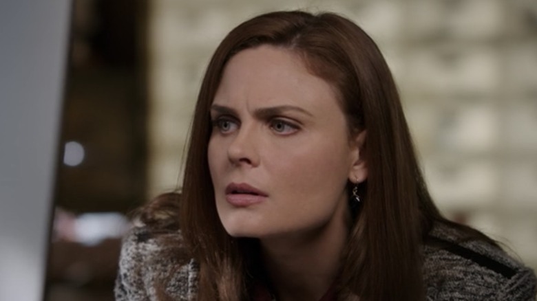 Bones furrowing her brow