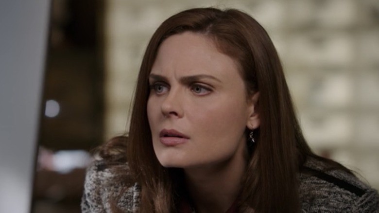 Bones furrowing her brow