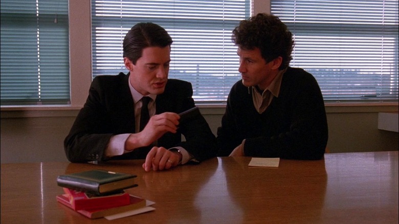 Cooper and Truman talking