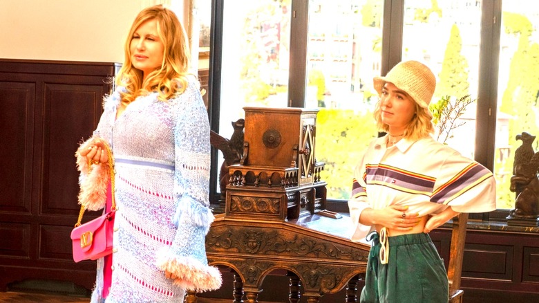 Tanya McQuoid and her assistant Portia stand in the White Lotus lobby in White Lotus (2021 - present)
