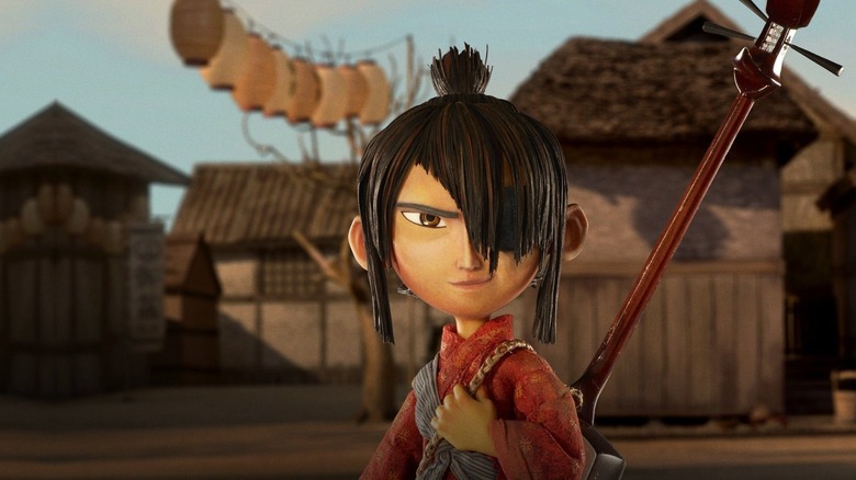 Kubo standing in a village in "Kubo and the Two Strings"