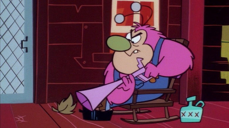 Fuzzy Lumpkins aims a gun at a leaf on his porch in "The Powerpuff Girls" (1998-2005)