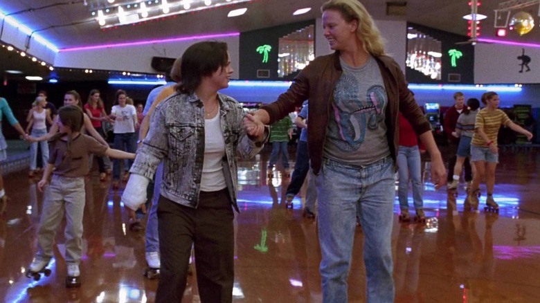 Aileen Wuornos and Selby Wall roller-skating together in "Monster" (2003)