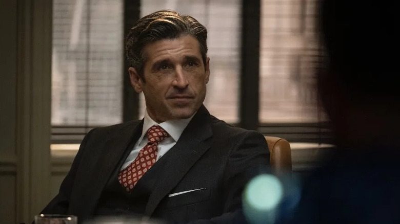 Morgan smirks at his desk in Devils