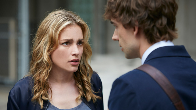 Annie looking at August in "Covert Affairs."