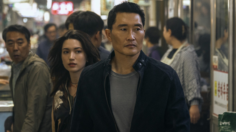 Rebecca and David in a crowded market in "Butterfly."