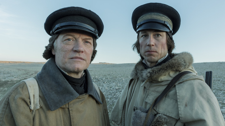 Captain Crozier and Cmdr Fitzjames stand on the ice looking into the distance in The Terror