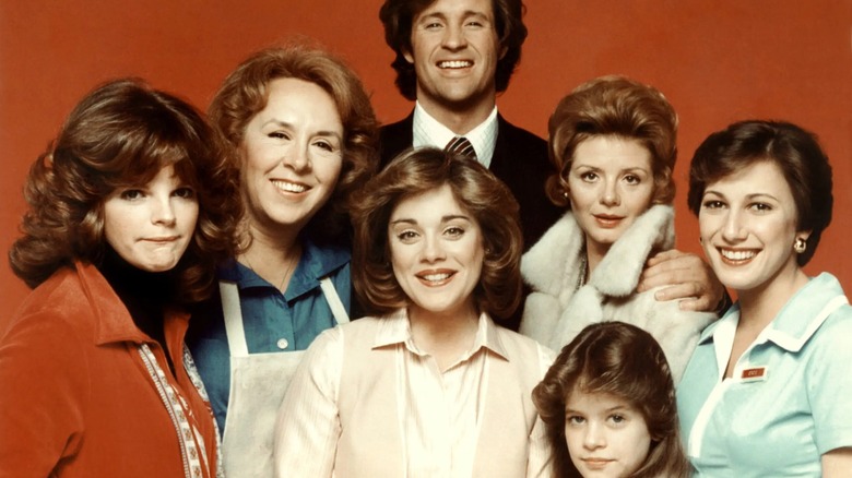 The cast of "Angie" smiling