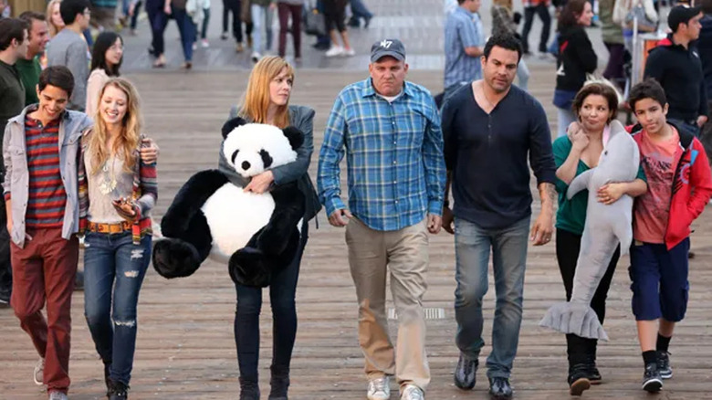 The Hernandez and Yoder families stroll in "Welcome to the Family"