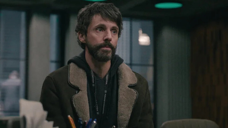 Morck sits uncomfortably at a desk in Dept Q.