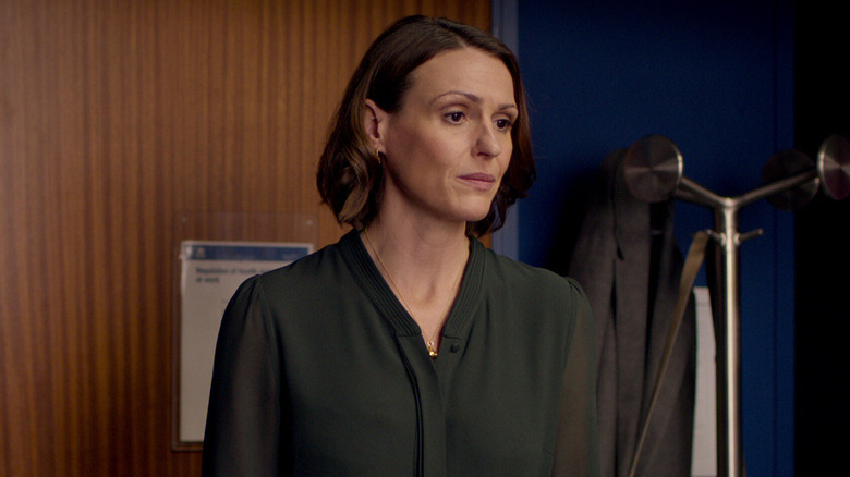 Dr. Foster looks concerned in Doctor Foster