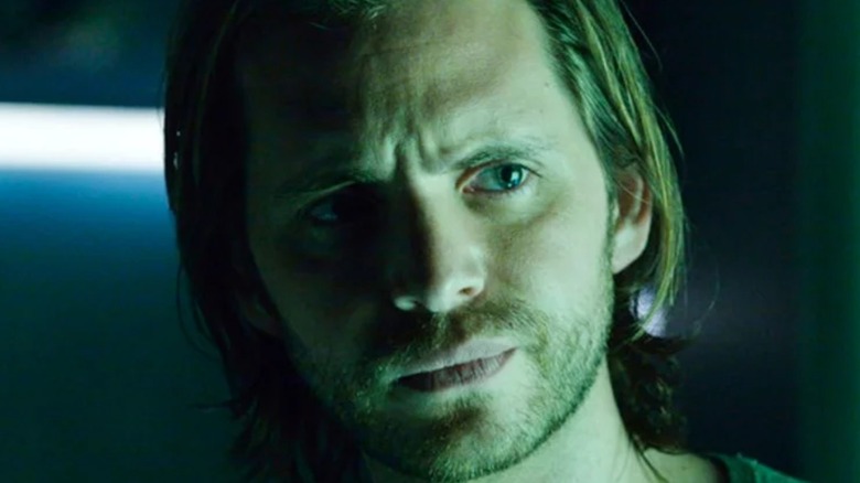 James Cole scowling in 12 Monkeys