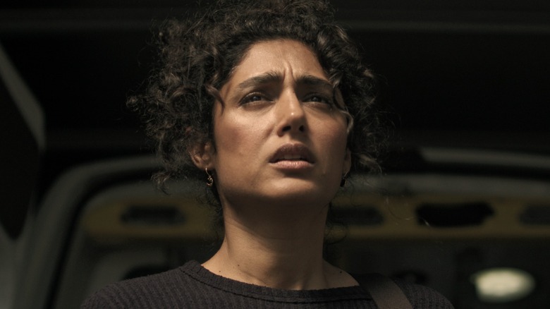 Aneesha looking into the distance in Invasion