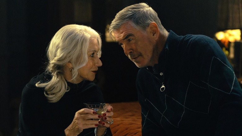 Conrad and Maeve share a drink in their bedroom