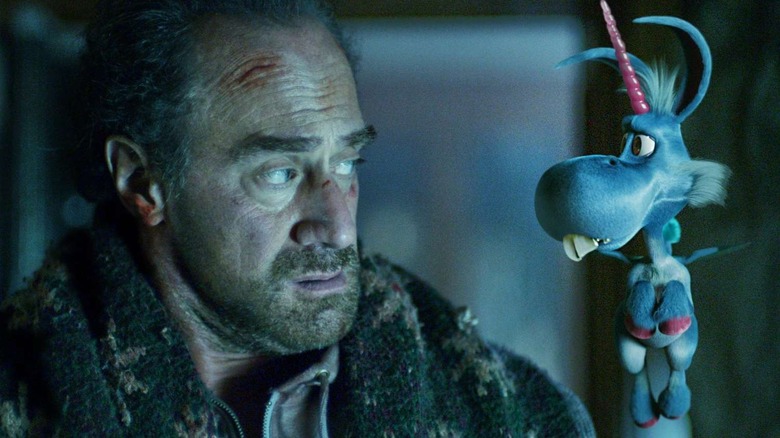 Nick Sax looking at Happy the unicorn on "Happy!" (2017-2019)
