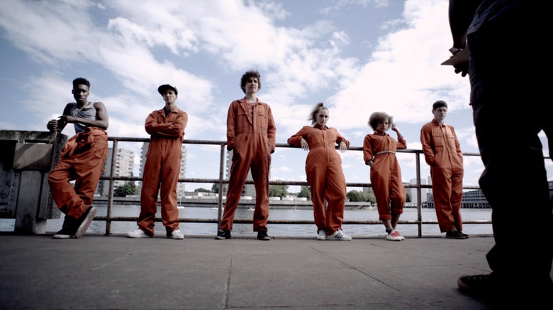 Misfits lined up against a guard rail on "Misfits" (2009-2013)