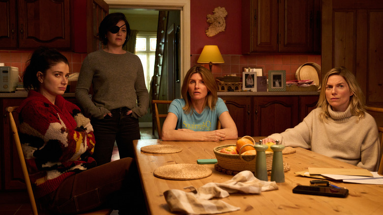Becka, Bibi, Eva, and and Ursula sit around the kitchen in "Bad Sisters" (2022-present)