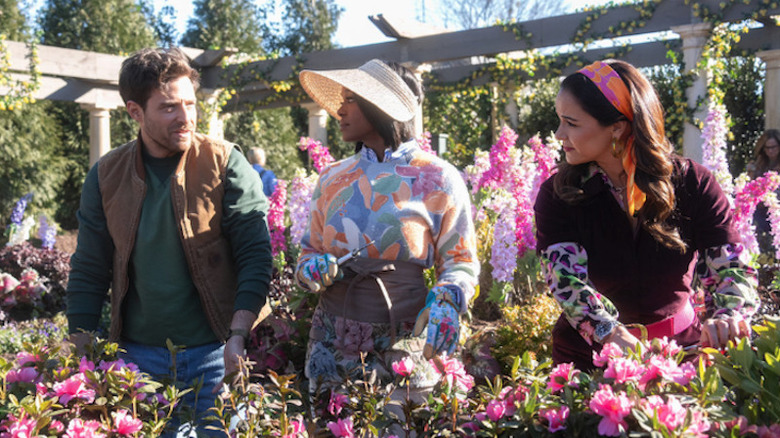 Brett, Catherine, and Birdie gardening and gossiping in "Grosse Pointe Garden Society" (2025)
