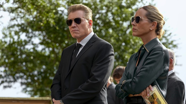 Harlan and Belle at an event in "The Waterfront" (2025)