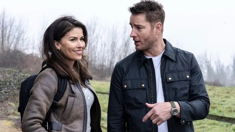 Shaw and Billie talk in a field in Tracker.