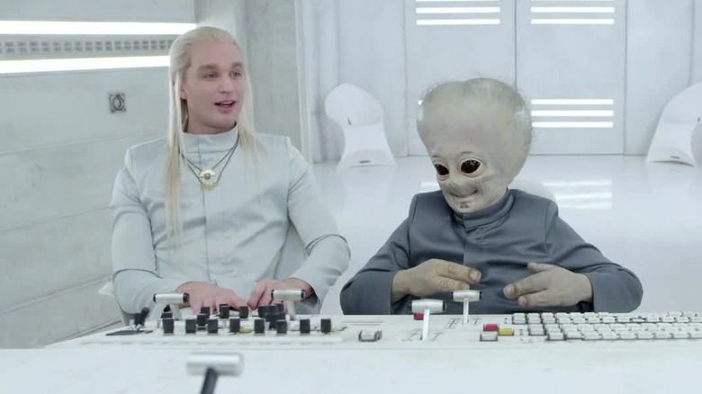 Jeff and Don sitting at a control panel in People of Earth