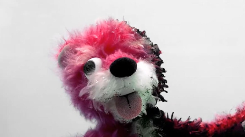 A damaged pink bear