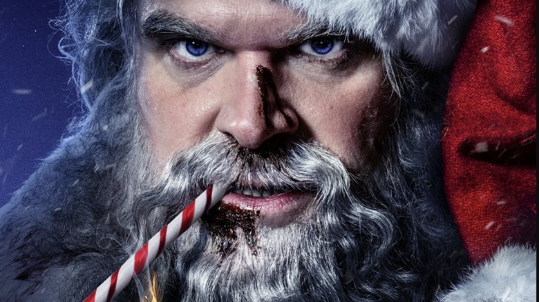 Santa with candy cane in mouth