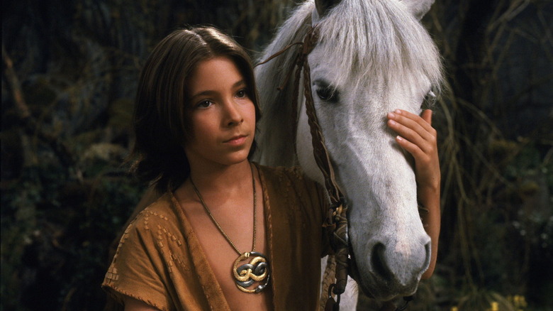 Atreyu pets his horse
