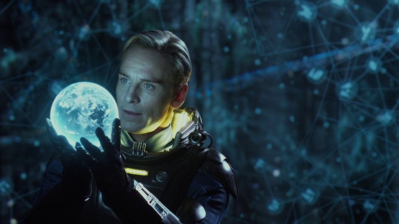David examining an Engineer artifact in Prometheus (2012)