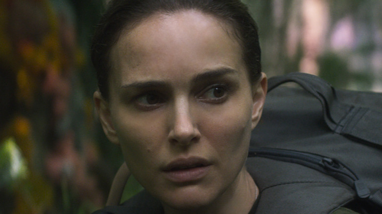 Suspicious Natale Portman looks to side