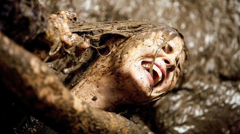Christine covered in mud in "Drag Me to Hell."