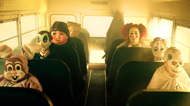 Children in costume sitting on a bus in "Trick 'r Treat."