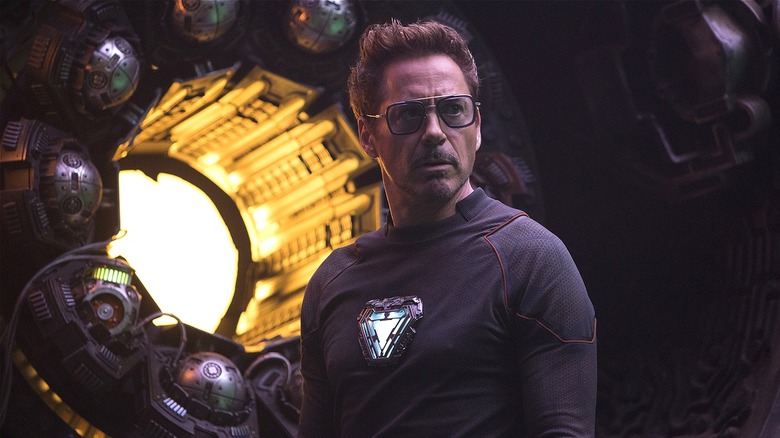 Tony Stark standing in front of a machine in Avengers: Endgame