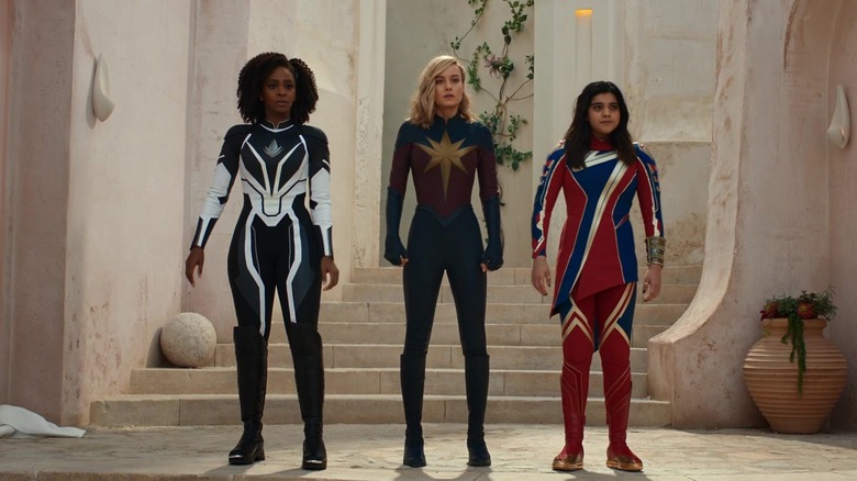 Monica Rambeau, Captain Marvel, and Kamala Khan standing together in The Marvels (2023)