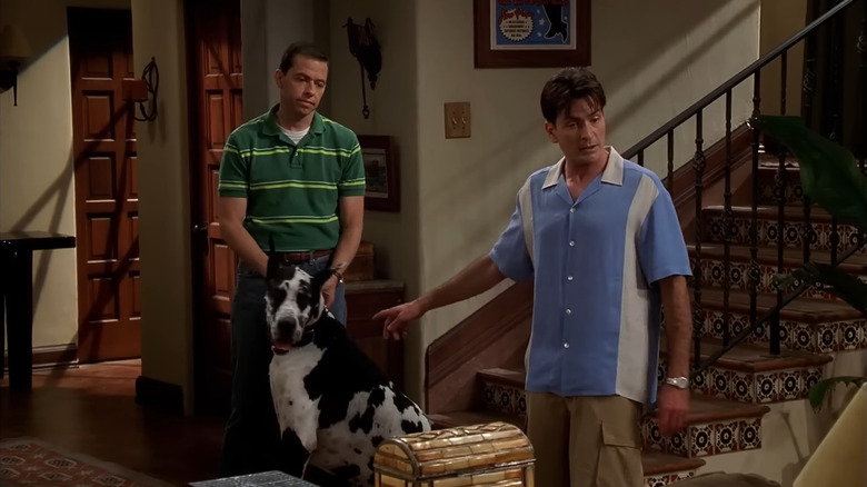Charlie Harper pointing at Chester in Two and a Half Men