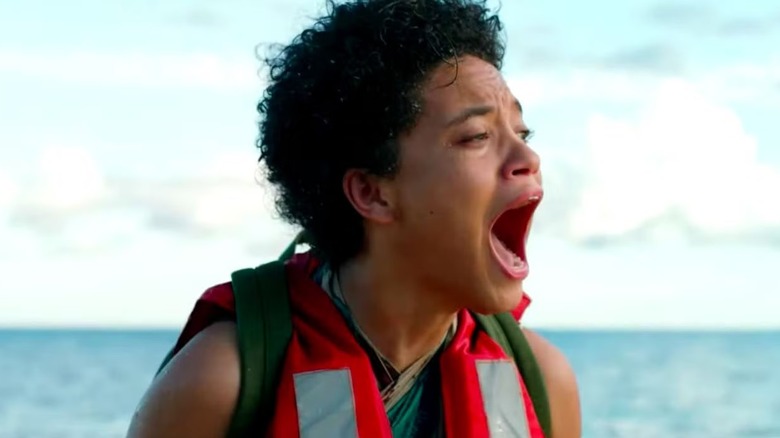 Jenn wearing an life vest and screaming in "Sweetheart."