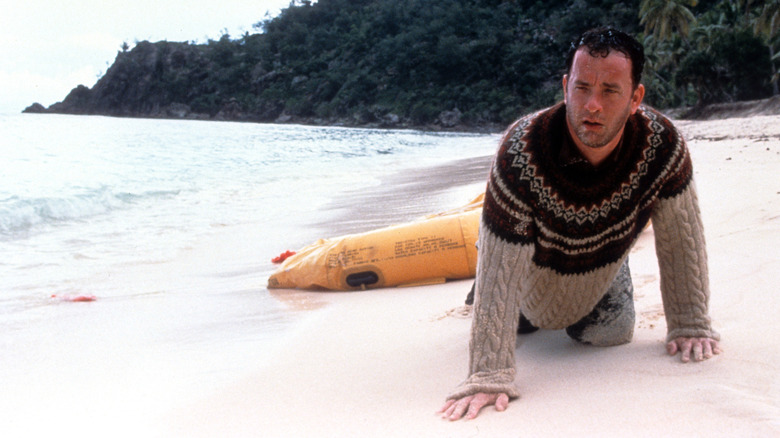 Chuck crawling on the beach in "Cast Away" (2000)