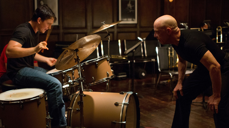 Andrew playing drums while Fletcher heckles him in "Whiplash" (2014)