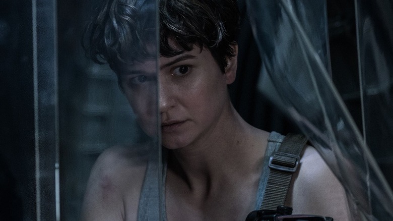 Danny holding a gun in "Alien: Covenant"