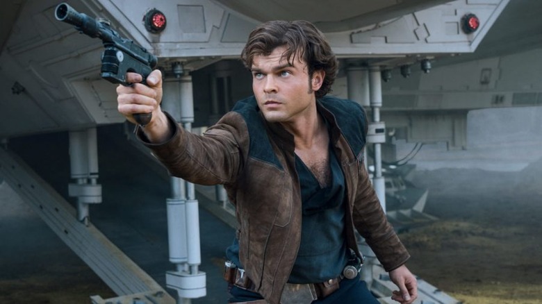 Han pointing his weapon in "Solo: A Star Wars Story"